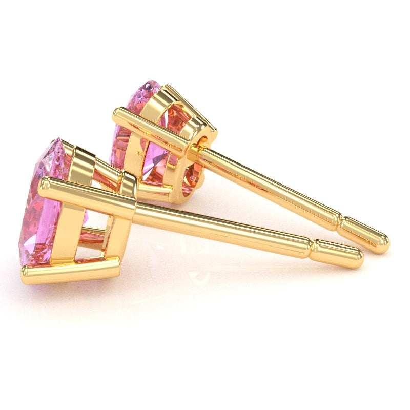 Lab-Created Pink Sapphire 7x5mm Oval Stud Earrings in 14k Yellow Gold