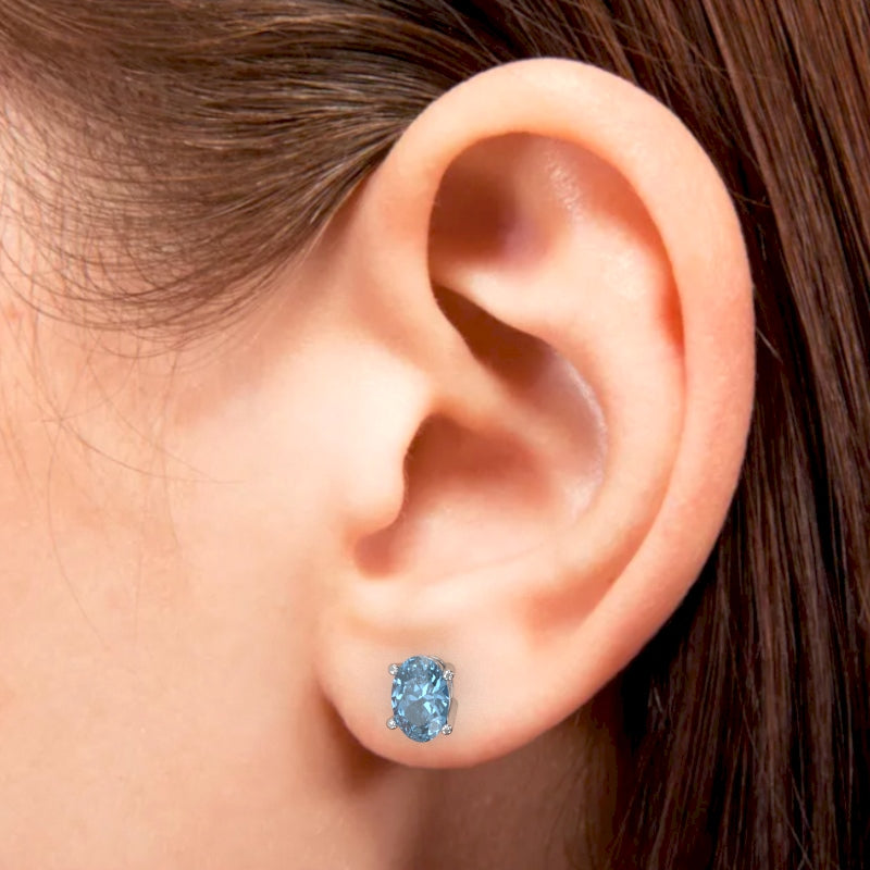 Blue Topaz 8x6mm Oval Stud Earrings in 14k White Gold