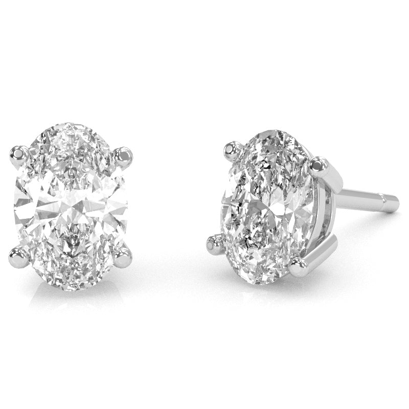 White Topaz 8x6mm Oval Stud Earrings in 14k White Gold