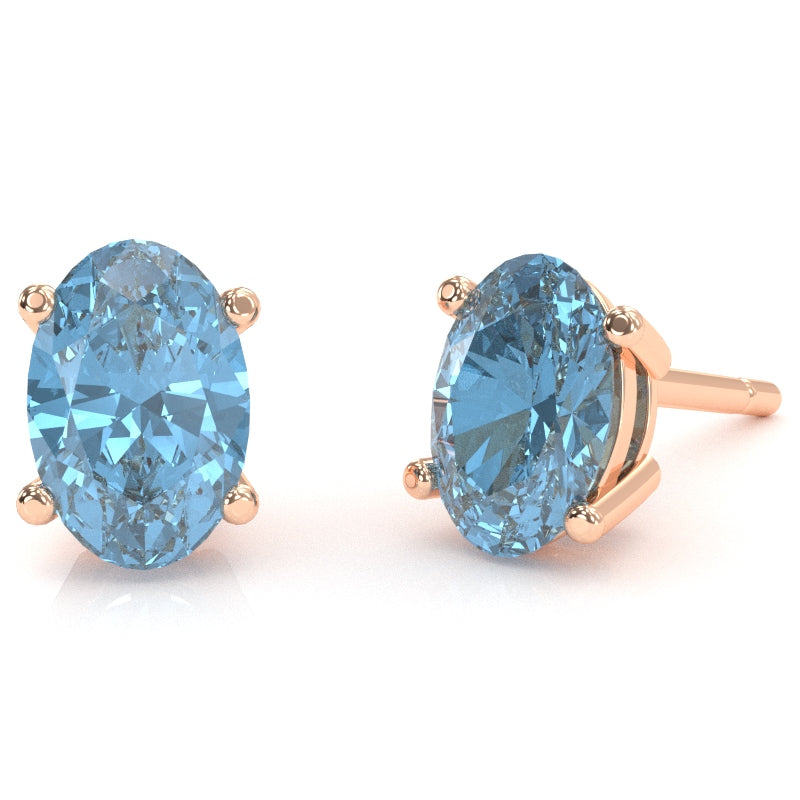 Blue Topaz 8x6mm Oval Stud Earrings in 14k Rose Gold