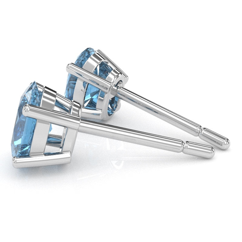 Blue Topaz 8x6mm Oval Stud Earrings in 14k White Gold