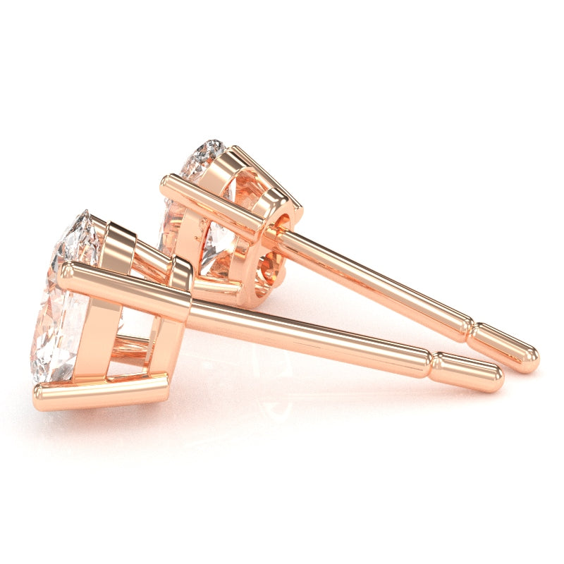 White Topaz 8x6mm Oval Stud Earrings in 14k Rose Gold