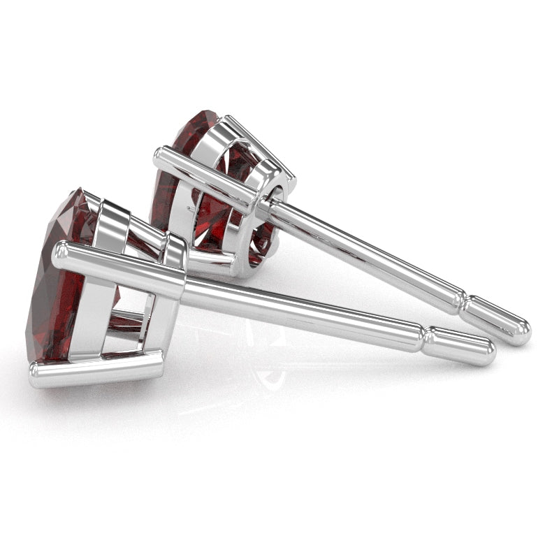 Lab-Created Ruby 7x5mm Oval Stud Earrings in 10k White Gold
